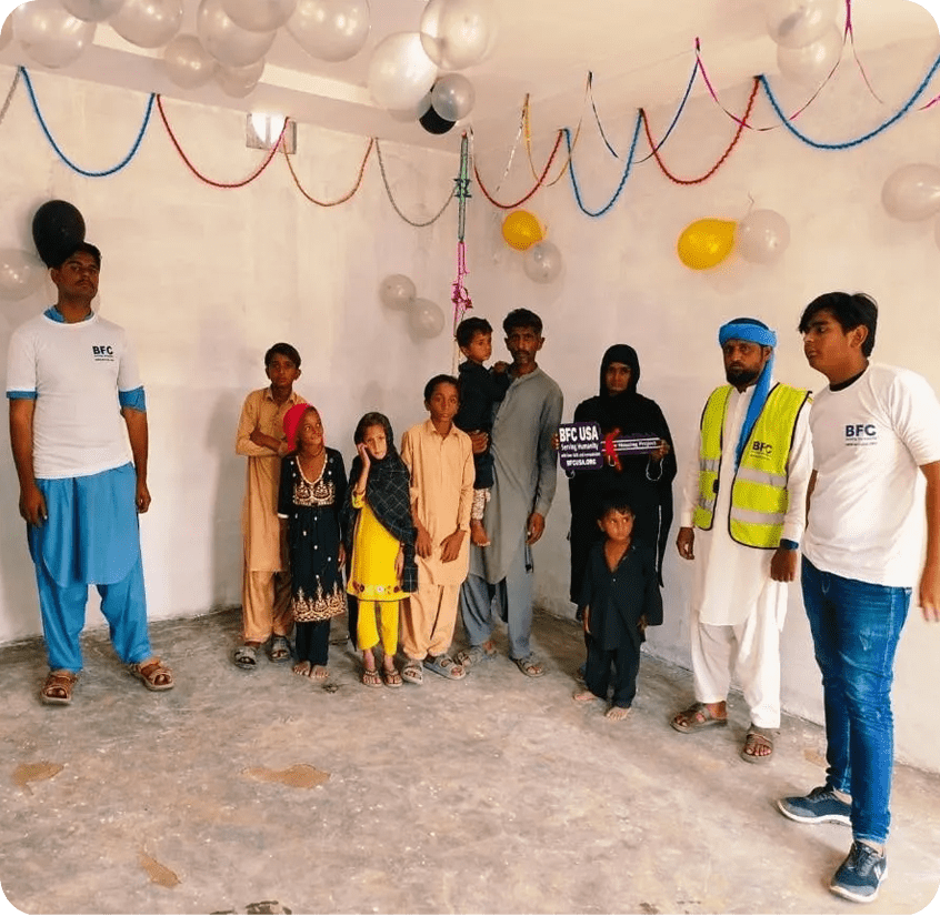 Group of people in decorated room.